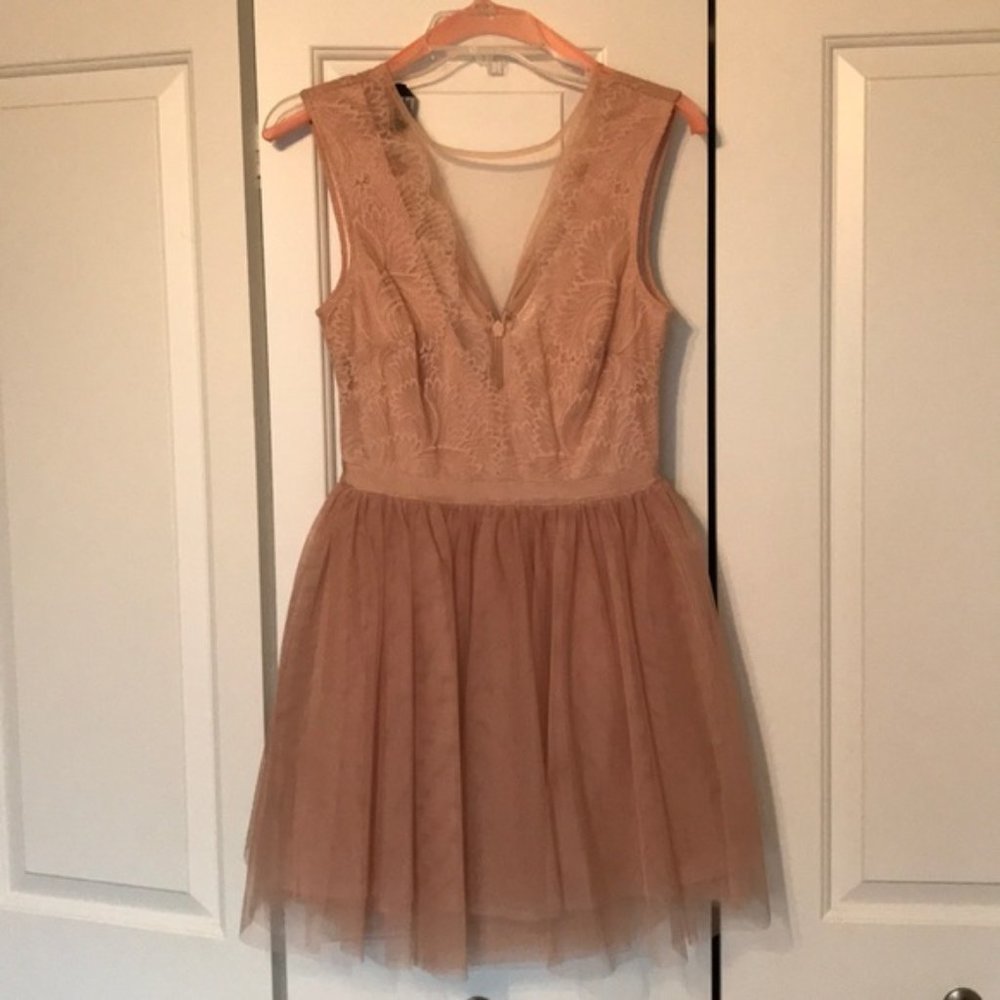 Adorable Bebe blush-colored deep-V neck tutu dress